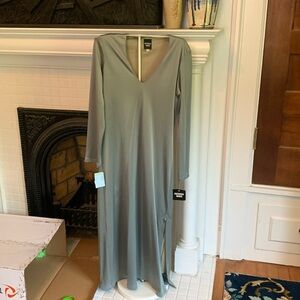 Patricia jibes fitted maxi dress with side slits. NWT. Retail 200‎
